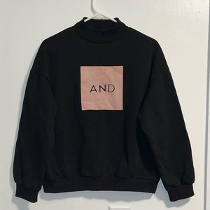 Cos by Cosette “And” high neck/turtleneck sweatshirt.